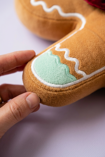 Mint cuff and plush edge detail held lightly in fingertips